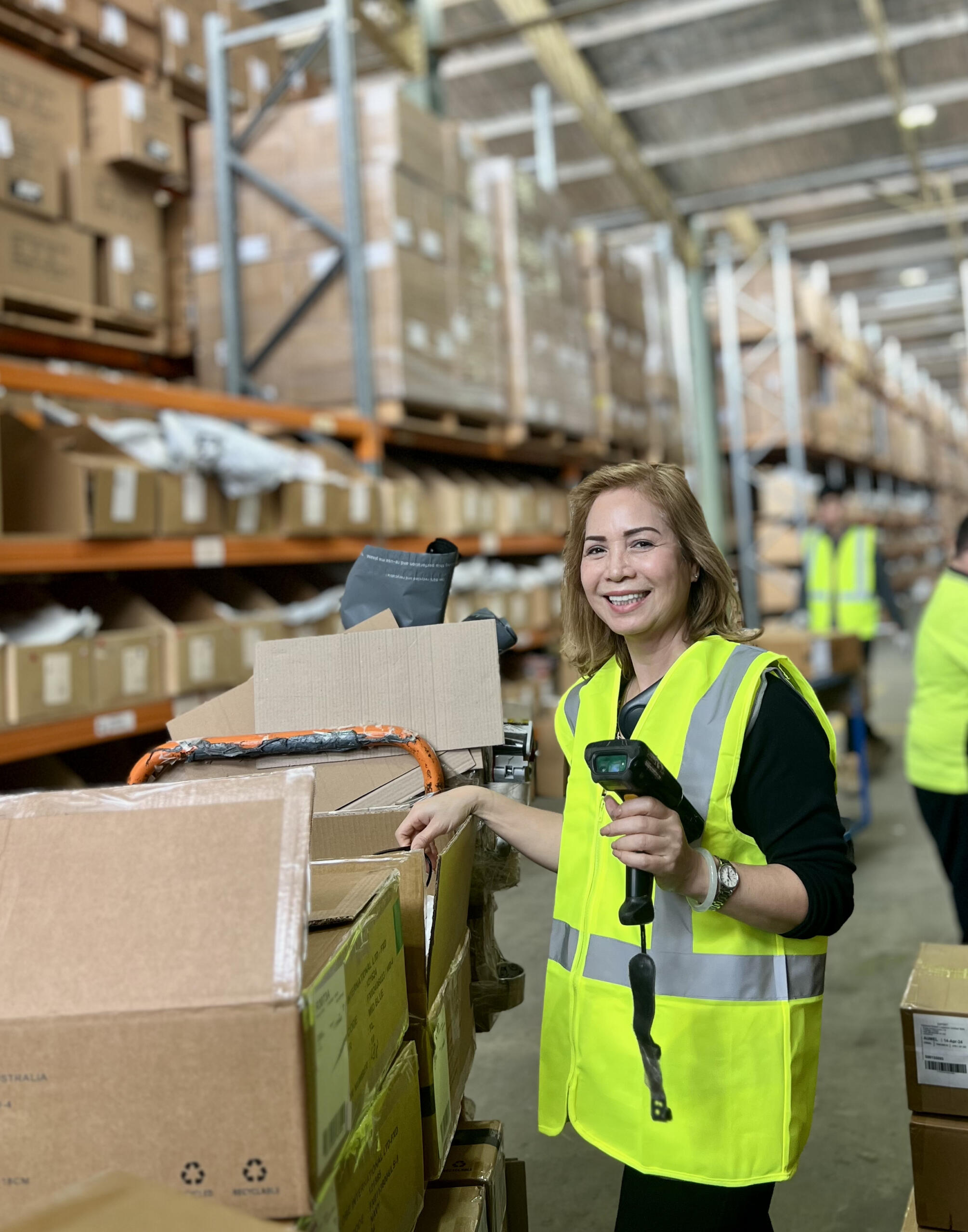 Warehouse staff scanning stock